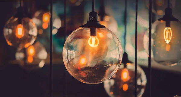 Żarówka FILAMENT LED G80 E27 6W Ciepła 2200K bursztynowa