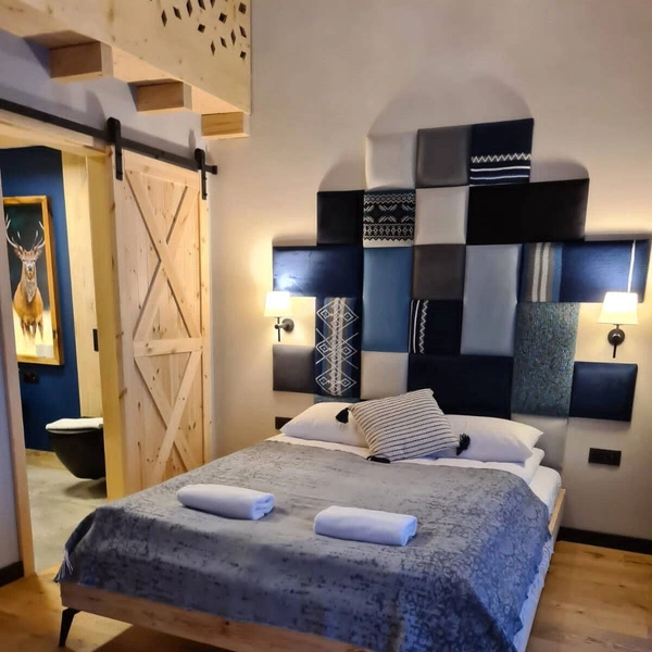 Czarny kinkiet TIVOLI z białym abażurem w nowoczesnym stylu